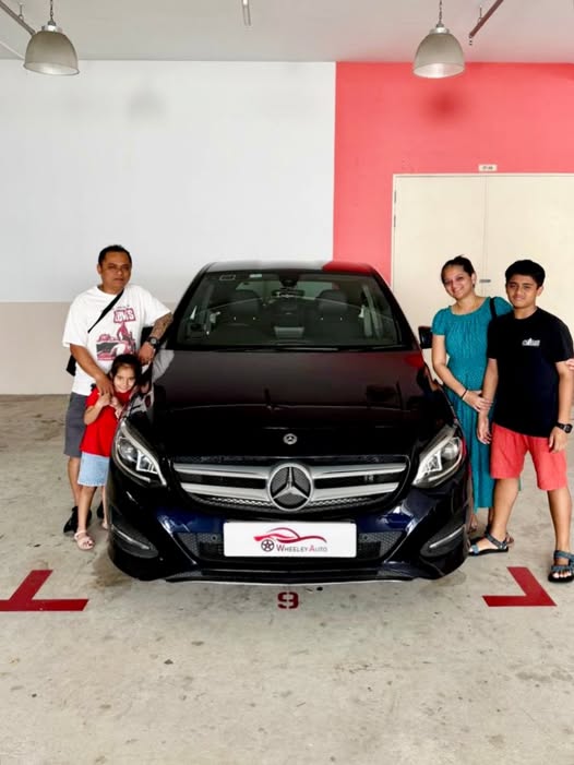 Zhen Gu taking delivery of his Mercedes B180 from Wheeley Auto