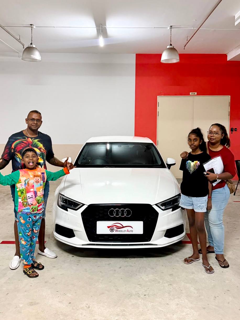 Joycelyn taking delivery of her Audi A3 Sedan from Wheeley Auto